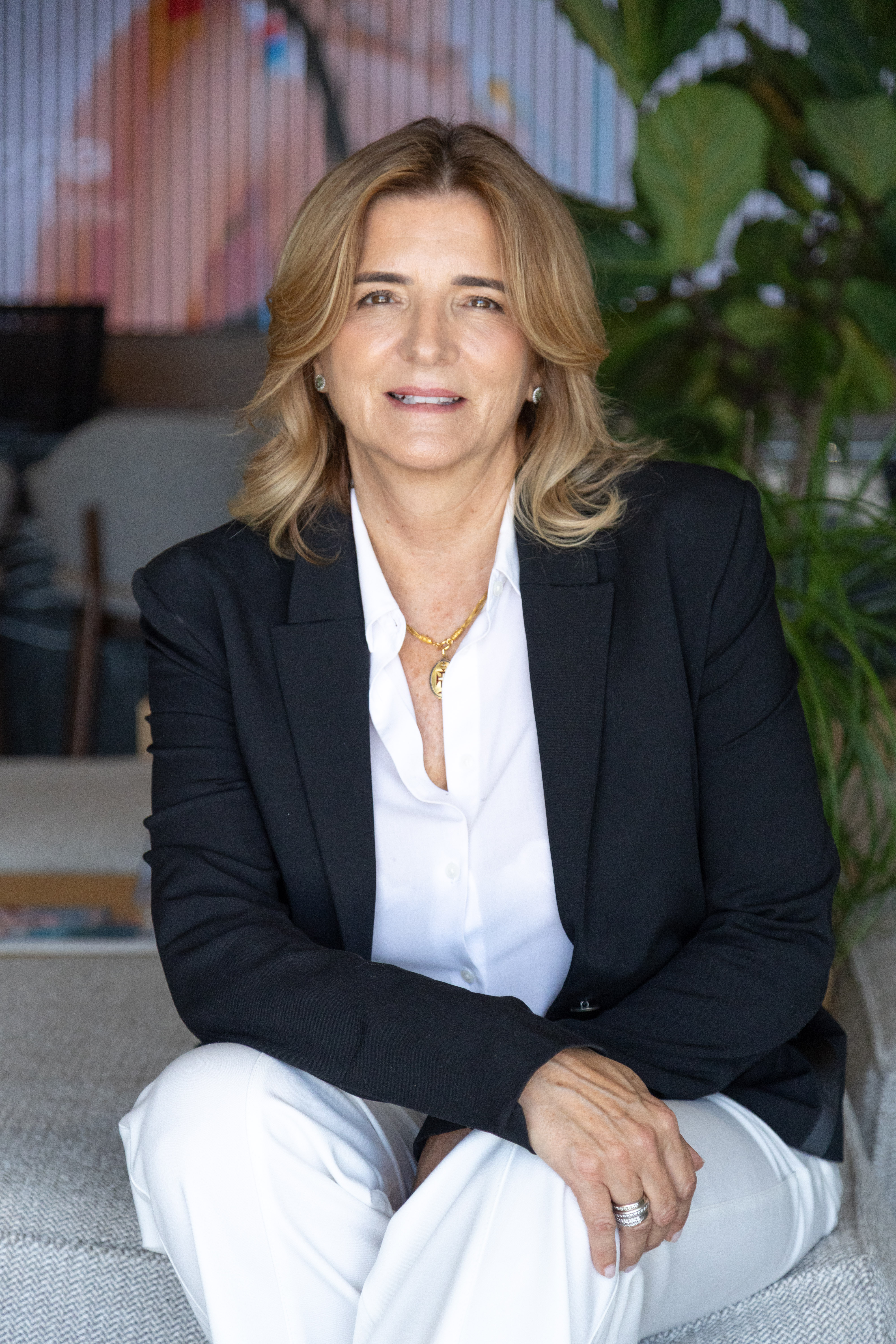 Filipa Pinto Cardoso in a professional founder portrait for brand presentation.